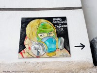Représentation des protections sanitaires inhérentes à l’expression artistique de l’artiste de rue, rue Maître-Albert (Paris, 5e arrondissement)