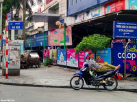 Emploi informel (moto-taxi) à Hanoï